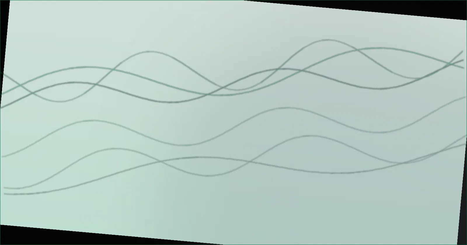 Cables routed through a vertical sleeve beside the leg of a standing desk as it rises