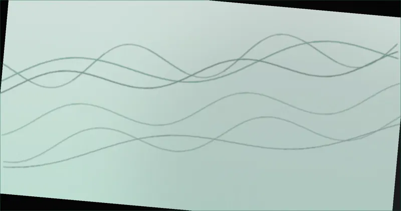 Cables routed through a vertical sleeve beside the leg of a standing desk as it rises